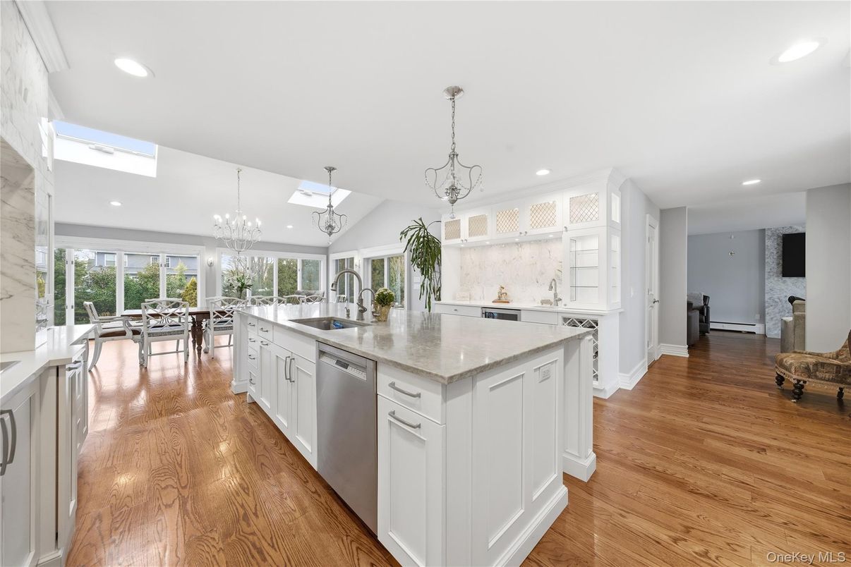 Dining room, Interior, Kitchen, Pendant Lights, Recessed Lighting, Stainless Steel Appliances, Wood Texture Flooring