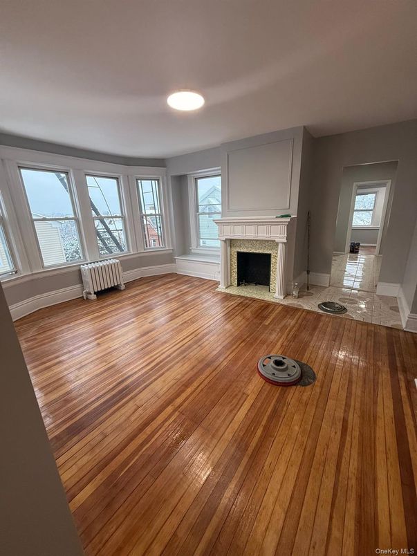 Empty room, Fireplace, Interior, Recessed Lighting, Wood Texture Flooring