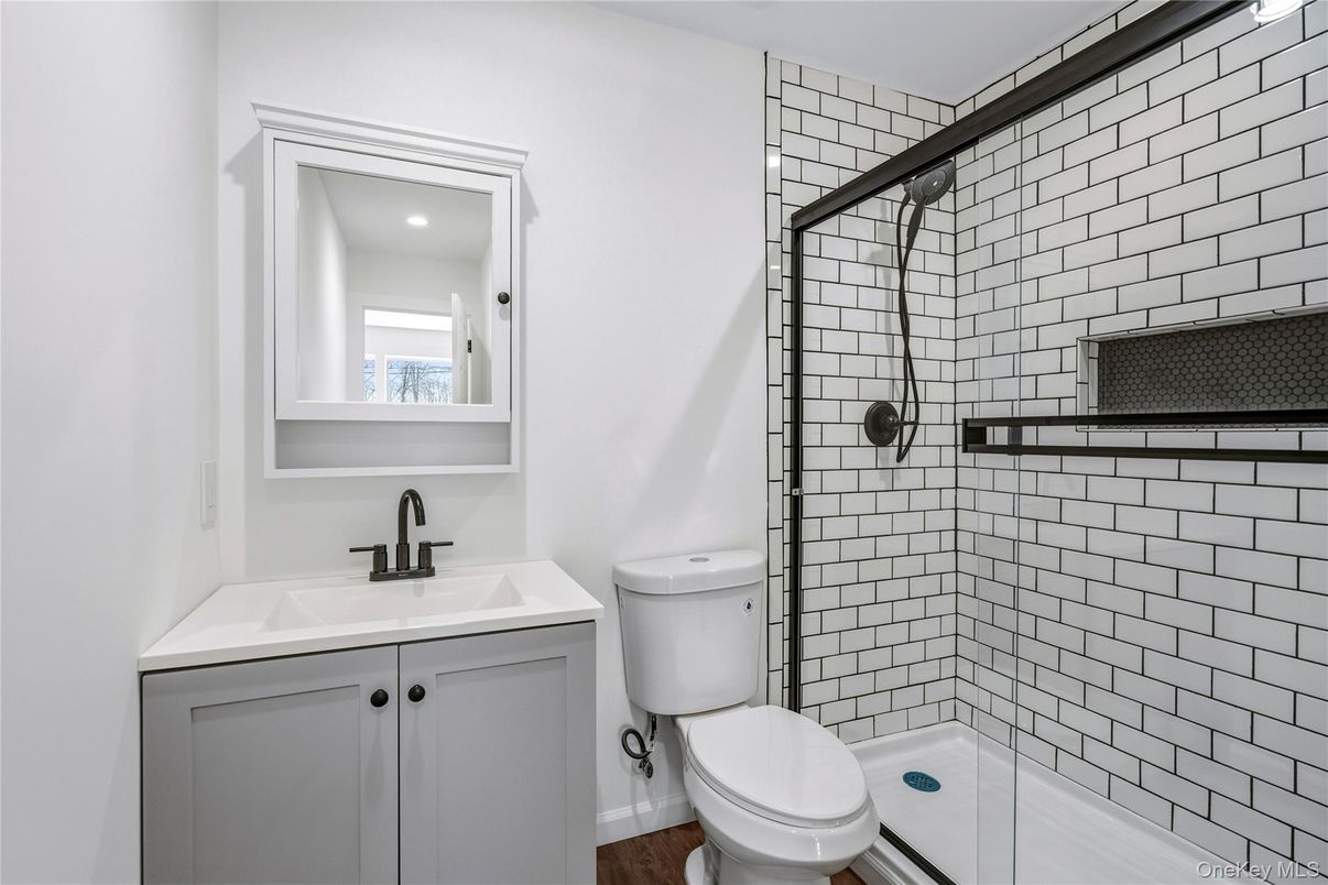 Bathroom, Glass Shower, Interior, Recessed Lighting, Wood Texture Flooring