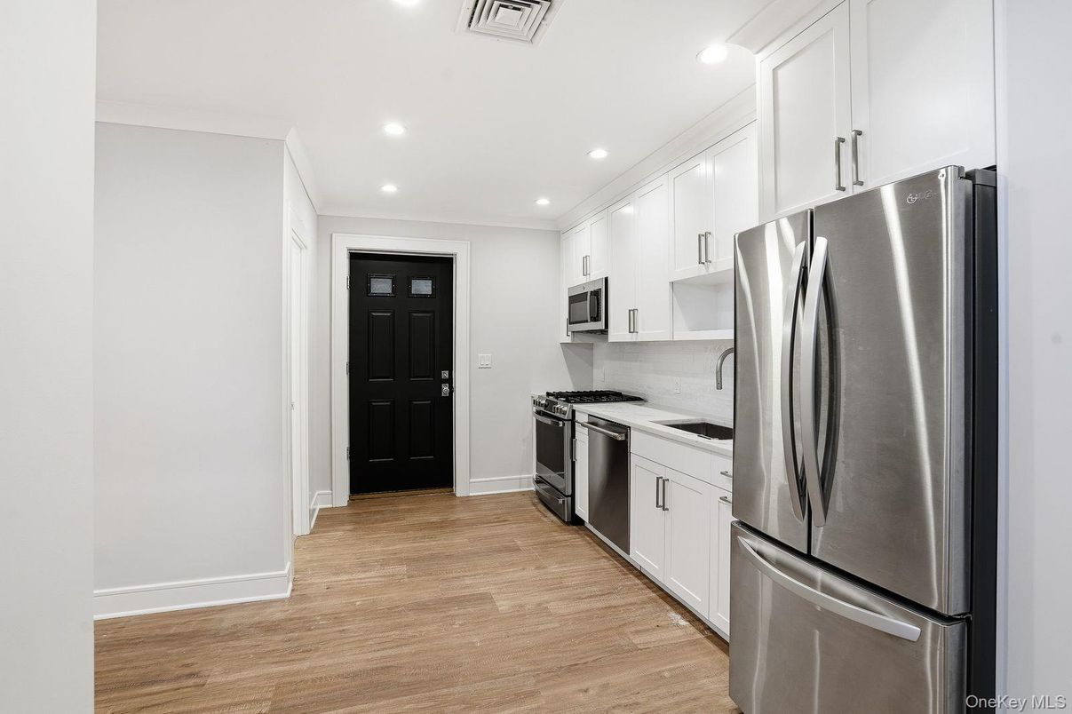 Interior, Kitchen, Recessed Lighting, Stainless Steel Appliances, Wood Texture Flooring