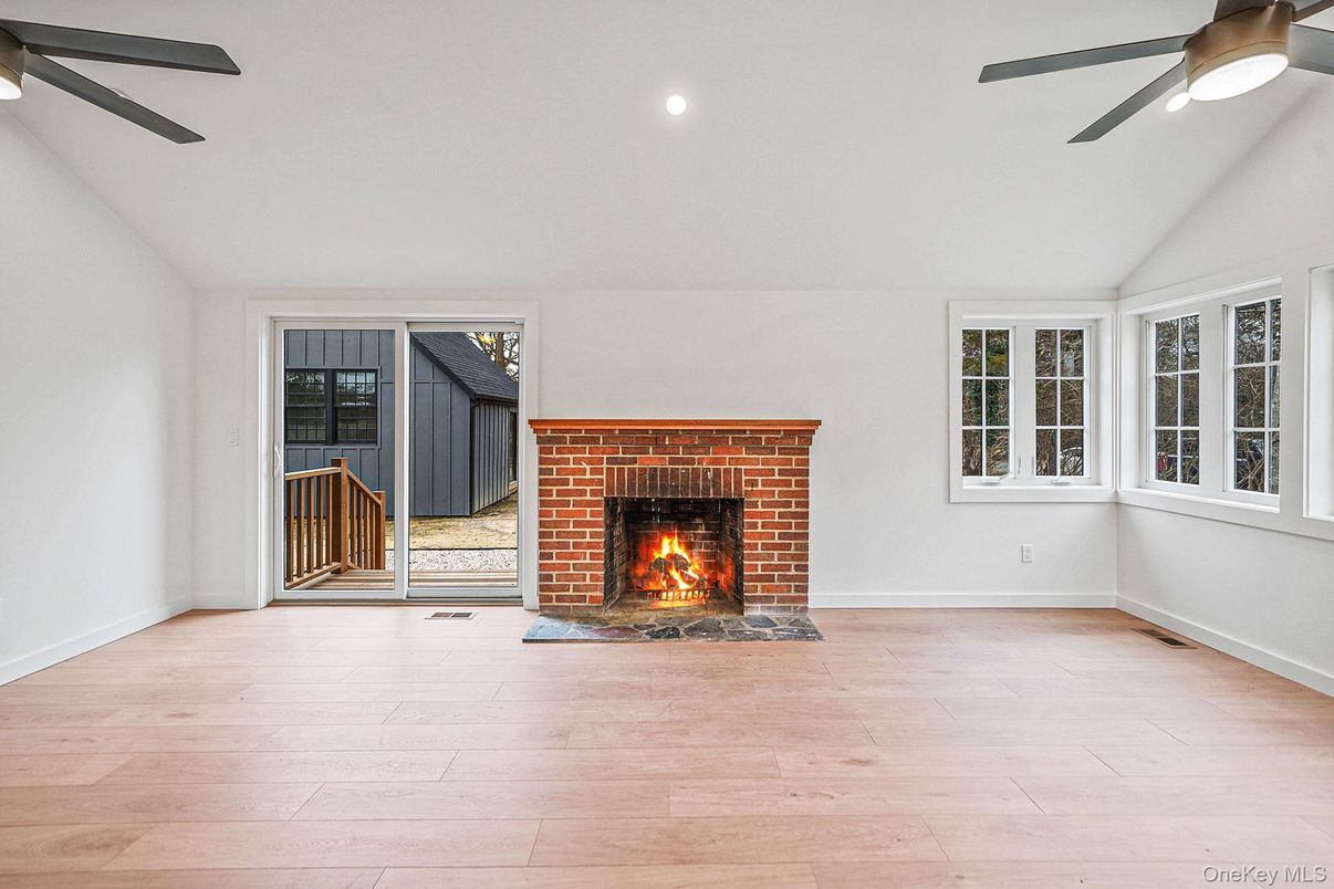 Empty room, Fireplace, Interior, Recessed Lighting, Wood Texture Flooring