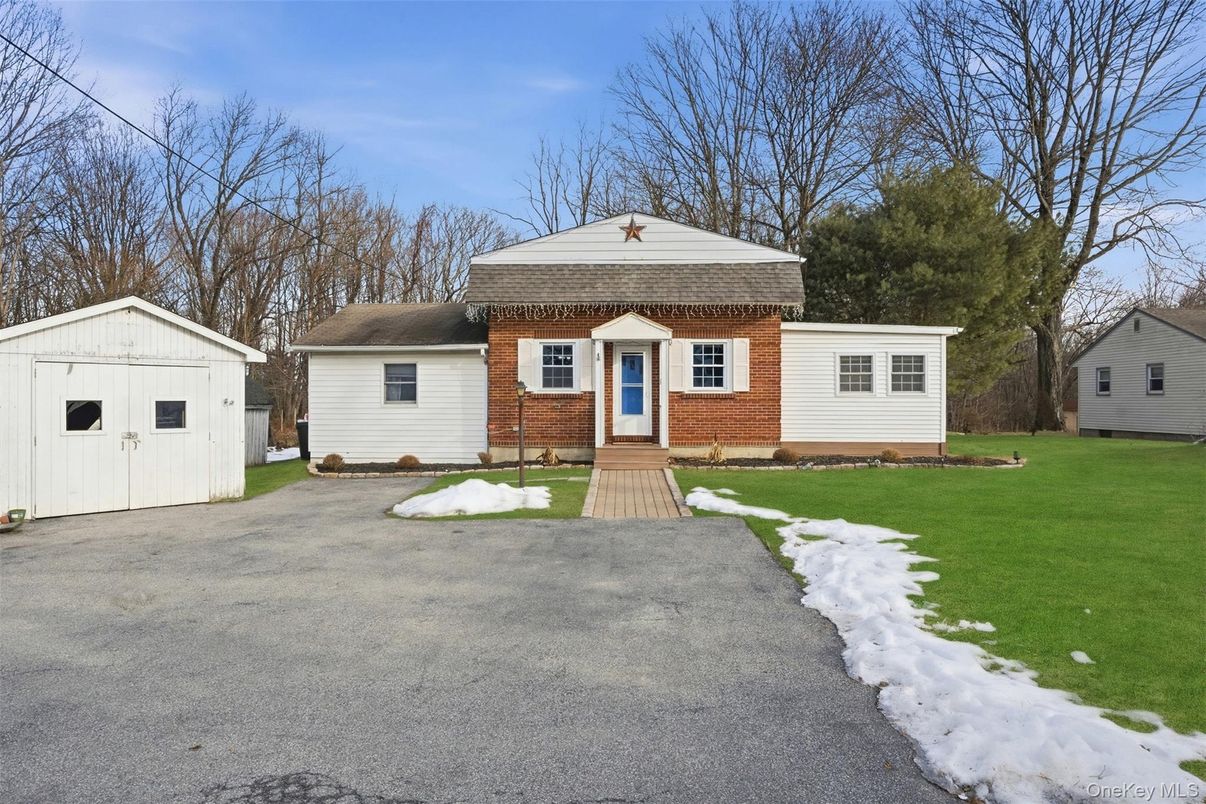 Exterior, Facade, Brick Facade, Cape Cod