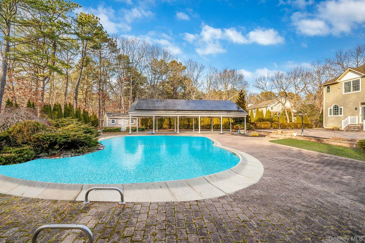 Exterior, Pool, Solar Panels