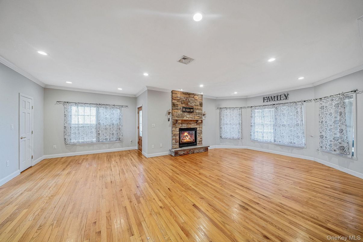 Empty room, Fireplace, Interior, Recessed Lighting, Wood Texture Flooring