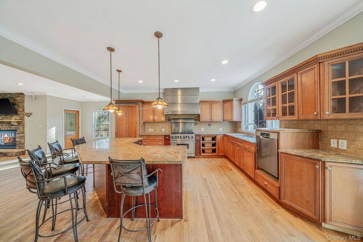 Fireplace, Interior, Kitchen, Pendant Lights, Recessed Lighting, Stainless Steel Appliances, Wood Texture Flooring