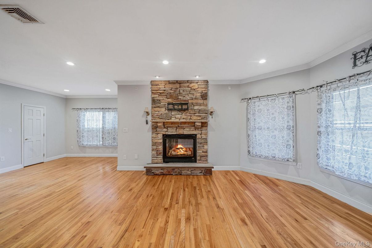 Empty room, Fireplace, Interior, Recessed Lighting, Wood Texture Flooring