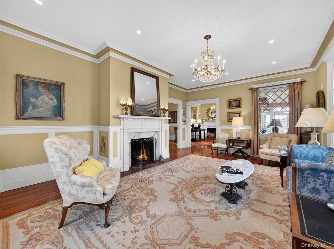 Chandelier, Fireplace, Interior, Living room, Recessed Lighting, Wood Texture Flooring