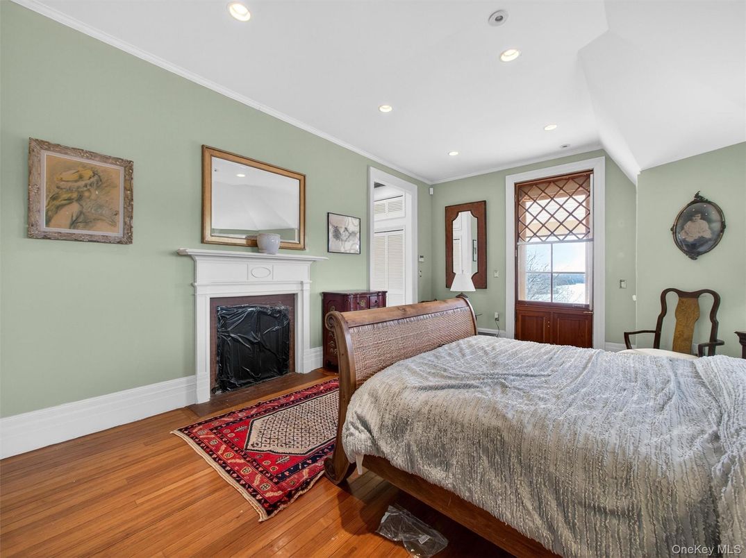 Bedroom, Fireplace, Interior, Recessed Lighting, Wood Texture Flooring