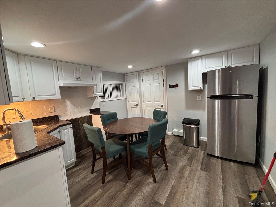 Dining room, Interior, Kitchen, Recessed Lighting, Stainless Steel Appliances, Wood Texture Flooring