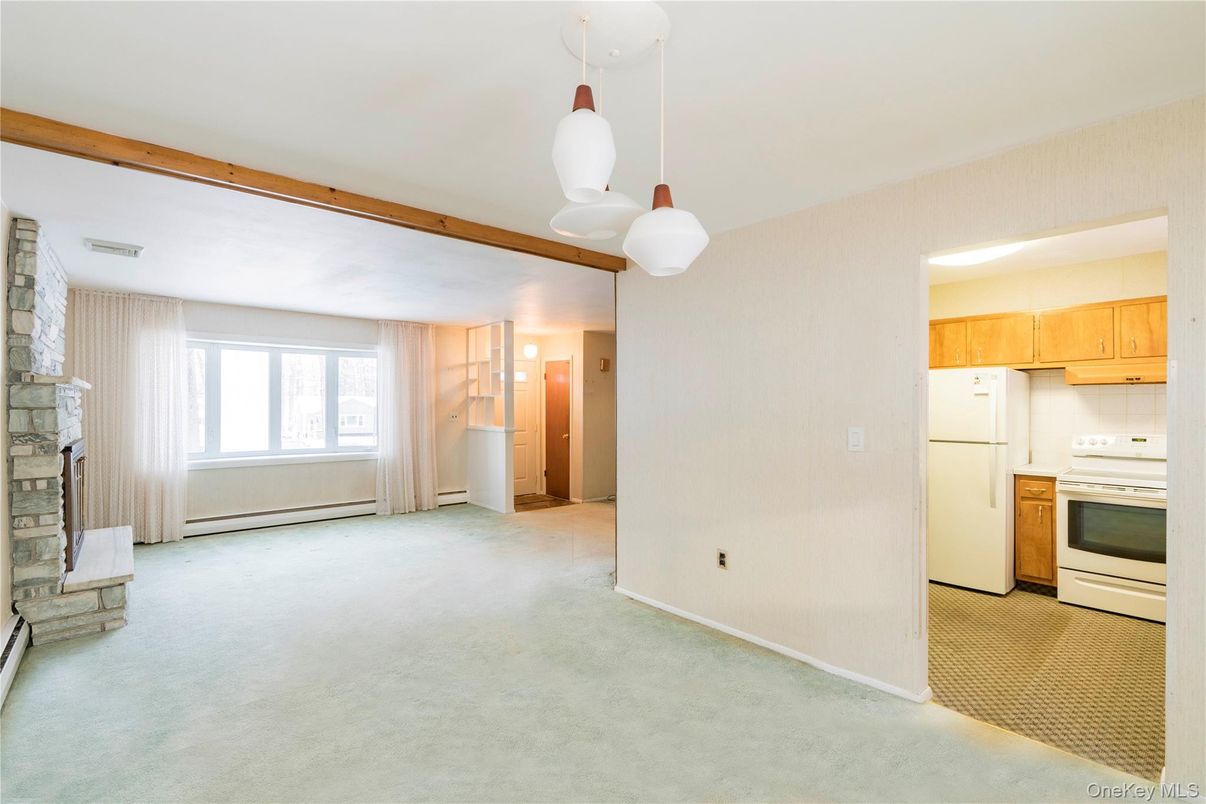 Empty room, Fireplace, Interior, Kitchen, Pendant Lights, Wooden Beams