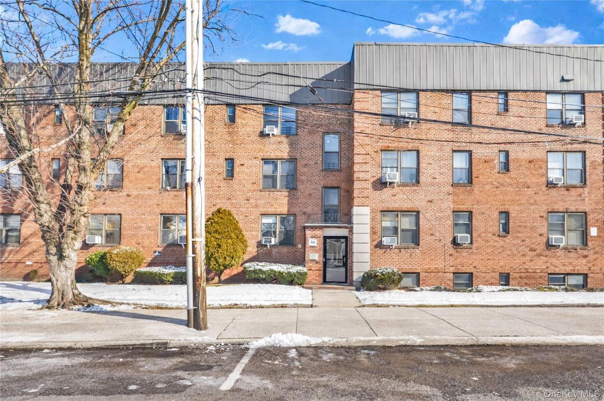 Exterior, Facade, Brick Facade, Condo Building