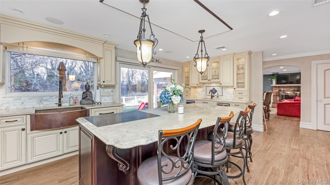 Fireplace, Interior, Kitchen, Pendant Lights, Recessed Lighting, Stainless Steel Appliances, Wood Texture Flooring