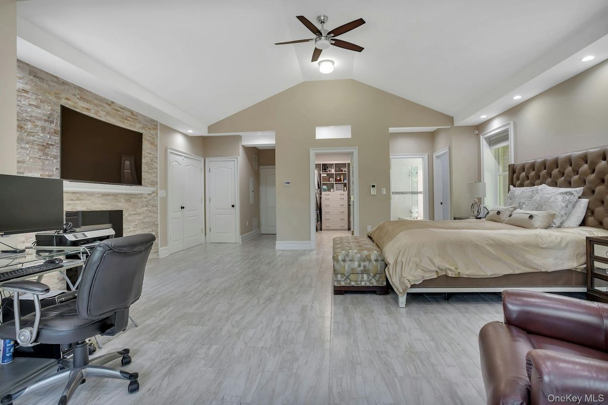 Bedroom, Fireplace, Home Office, Interior, Recessed Lighting, Stone Walls, Wood Texture Flooring