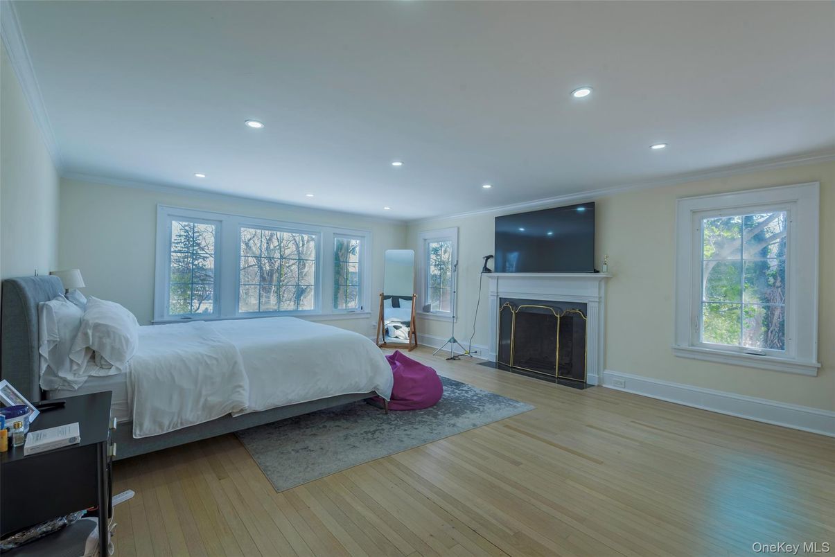 Bedroom, Fireplace, Interior, Recessed Lighting, Wood Texture Flooring