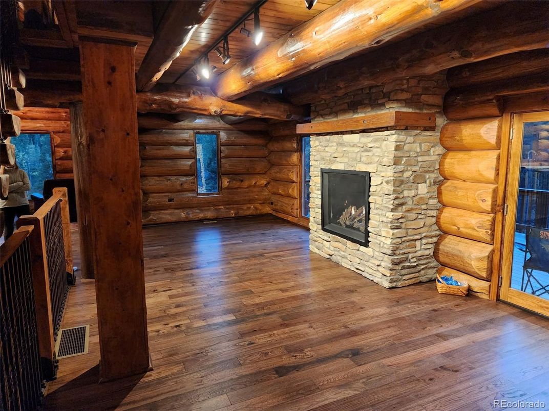 Empty room, Fireplace, Interior, Stone Walls, Wooden Beams, Wooden Ceilings, Wood Texture Flooring, Wooden Walls