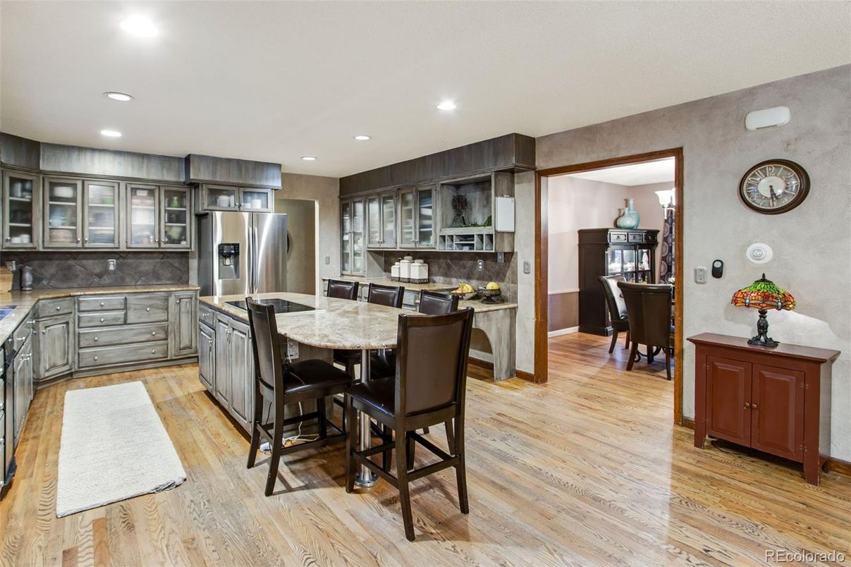 Dining room, Interior, Kitchen, Recessed Lighting, Stainless Steel Appliances, Wood Texture Flooring