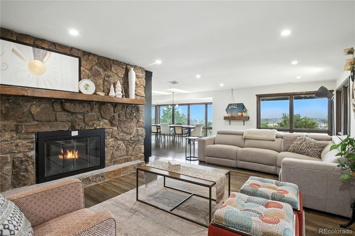 Dining room, Fireplace, Interior, Living room, Pendant Lights, Recessed Lighting, Stone Walls, Wood Texture Flooring