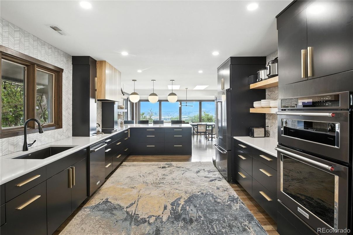 Dining room, Interior, Kitchen, Pendant Lights, Recessed Lighting, Stainless Steel Appliances, Water, Wood Texture Flooring