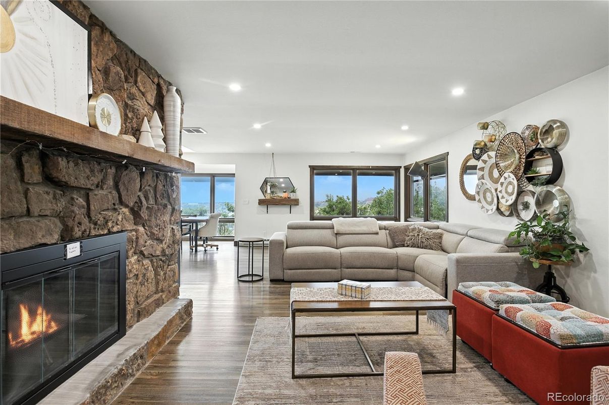 Dining room, Fireplace, Interior, Living room, Pendant Lights, Recessed Lighting, Stone Walls, Wood Texture Flooring