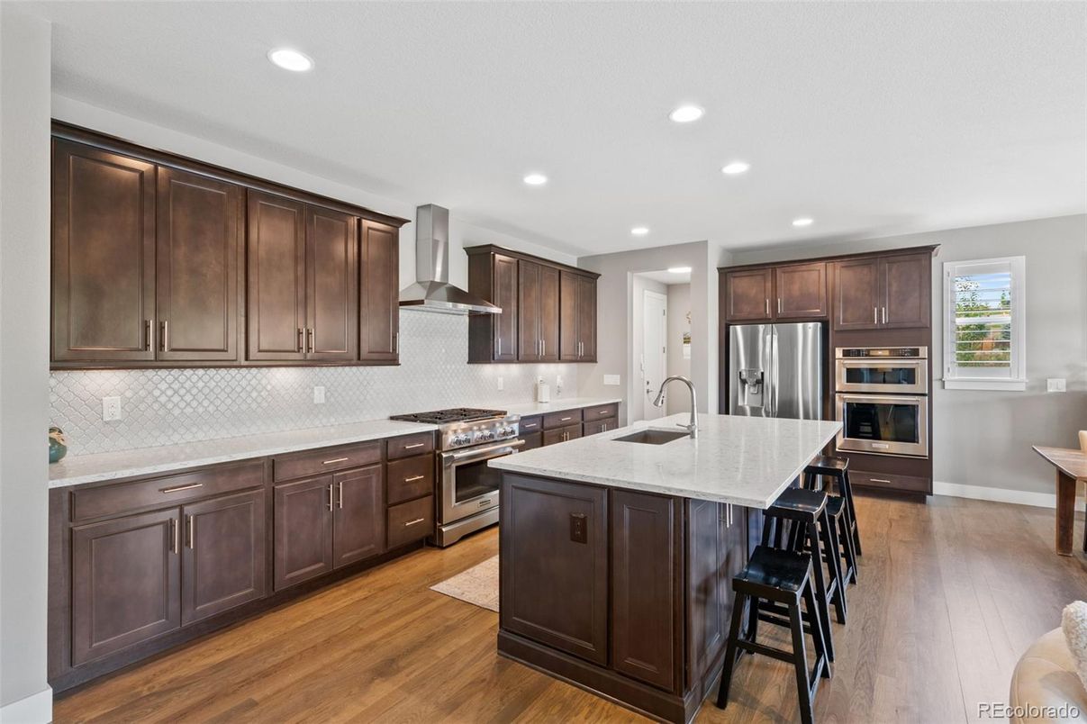 Interior, Kitchen, Recessed Lighting, Stainless Steel Appliances, Wood Texture Flooring
