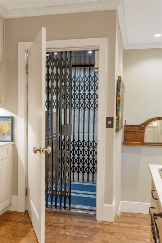 Elevator, Interior, Recessed Lighting, Wood Texture Flooring