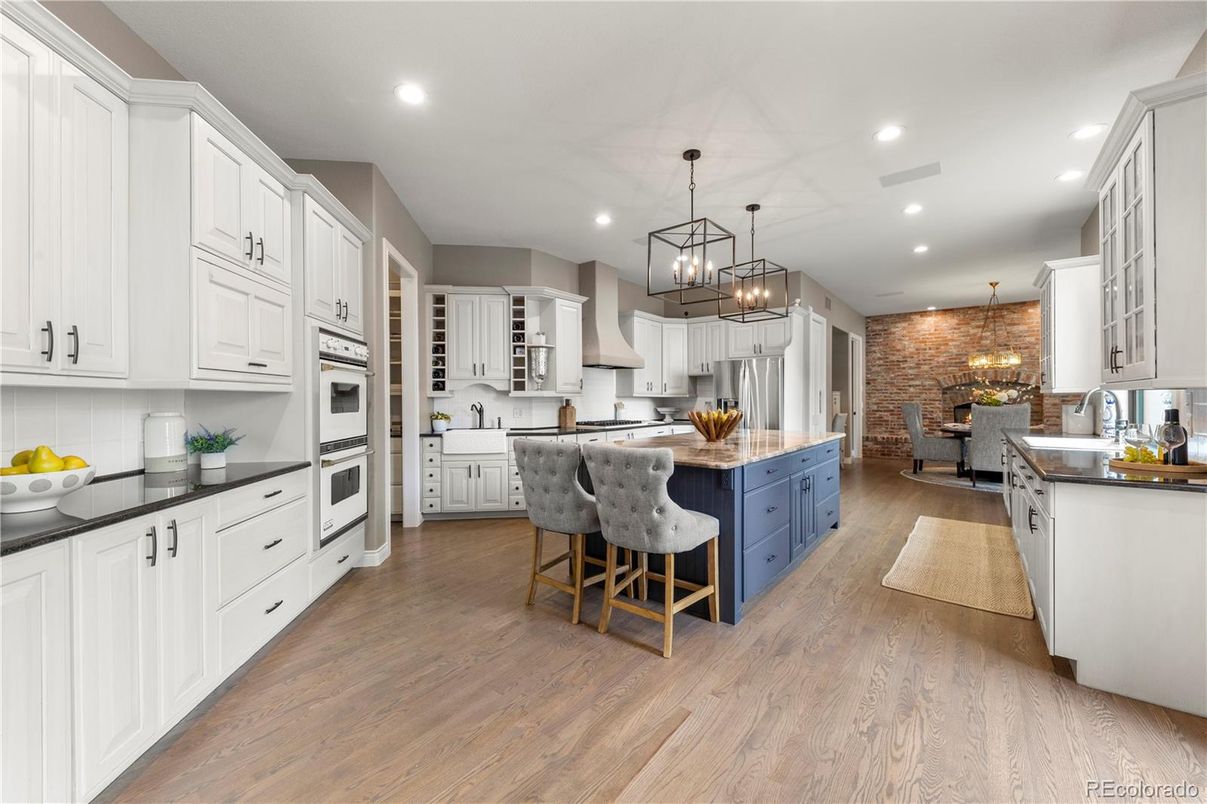 Dining room, Interior, Kitchen, Pendant Lights, Recessed Lighting, Stainless Steel Appliances, Stone Walls, Wood Texture Flooring
