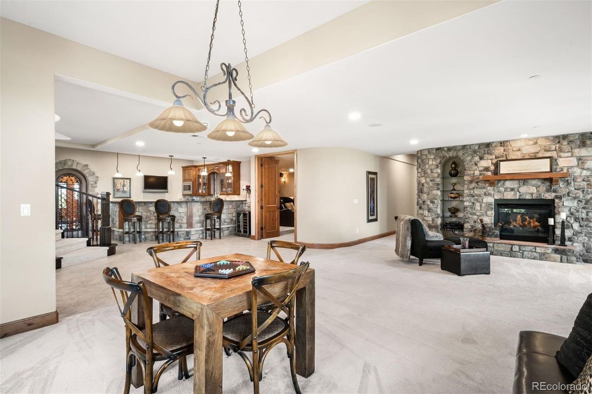 Chandelier, Dining room, Fireplace, Interior, Kitchen, Living room, Pendant Lights, Recessed Lighting, Stone Walls