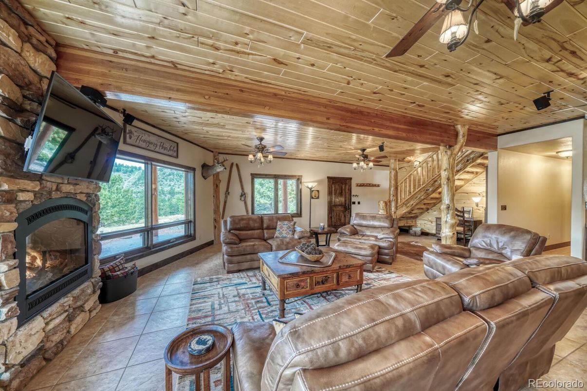 Chandelier, Fireplace, Interior, Living room, Wooden Ceilings