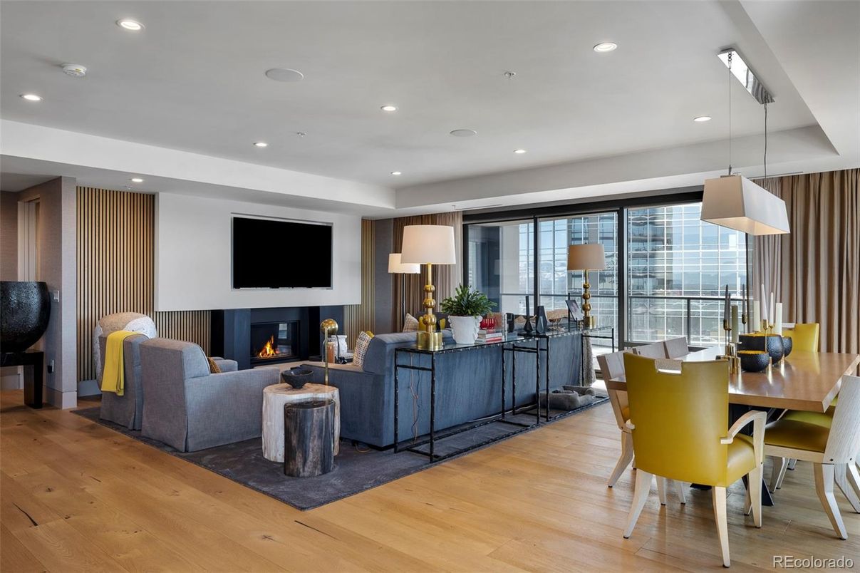 Dining room, Fireplace, Interior, Living room, Pendant Lights, Recessed Lighting, Wood Texture Flooring