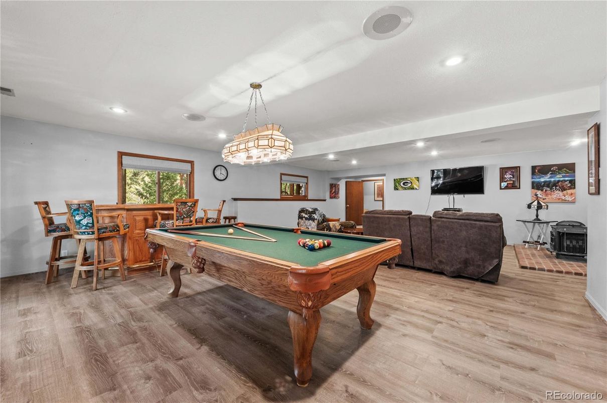 Billiard Table, Game Room, Interior, Living room, Pendant Lights, Recessed Lighting, Wood Texture Flooring