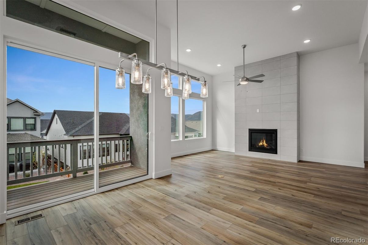 Empty room, Fireplace, Interior, Pendant Lights, Recessed Lighting, Wood Texture Flooring