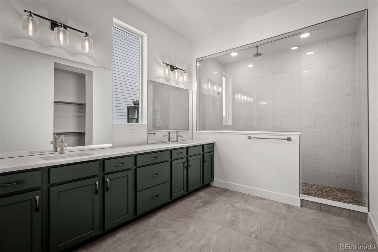 Bathroom, Dual Sink Vanities, Glass Shower, Interior, Marble Walls, Recessed Lighting