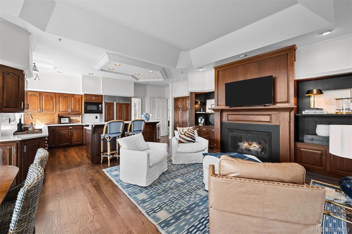 Fireplace, Interior, Kitchen, Living room, Recessed Lighting, Stainless Steel Appliances, Wood Texture Flooring