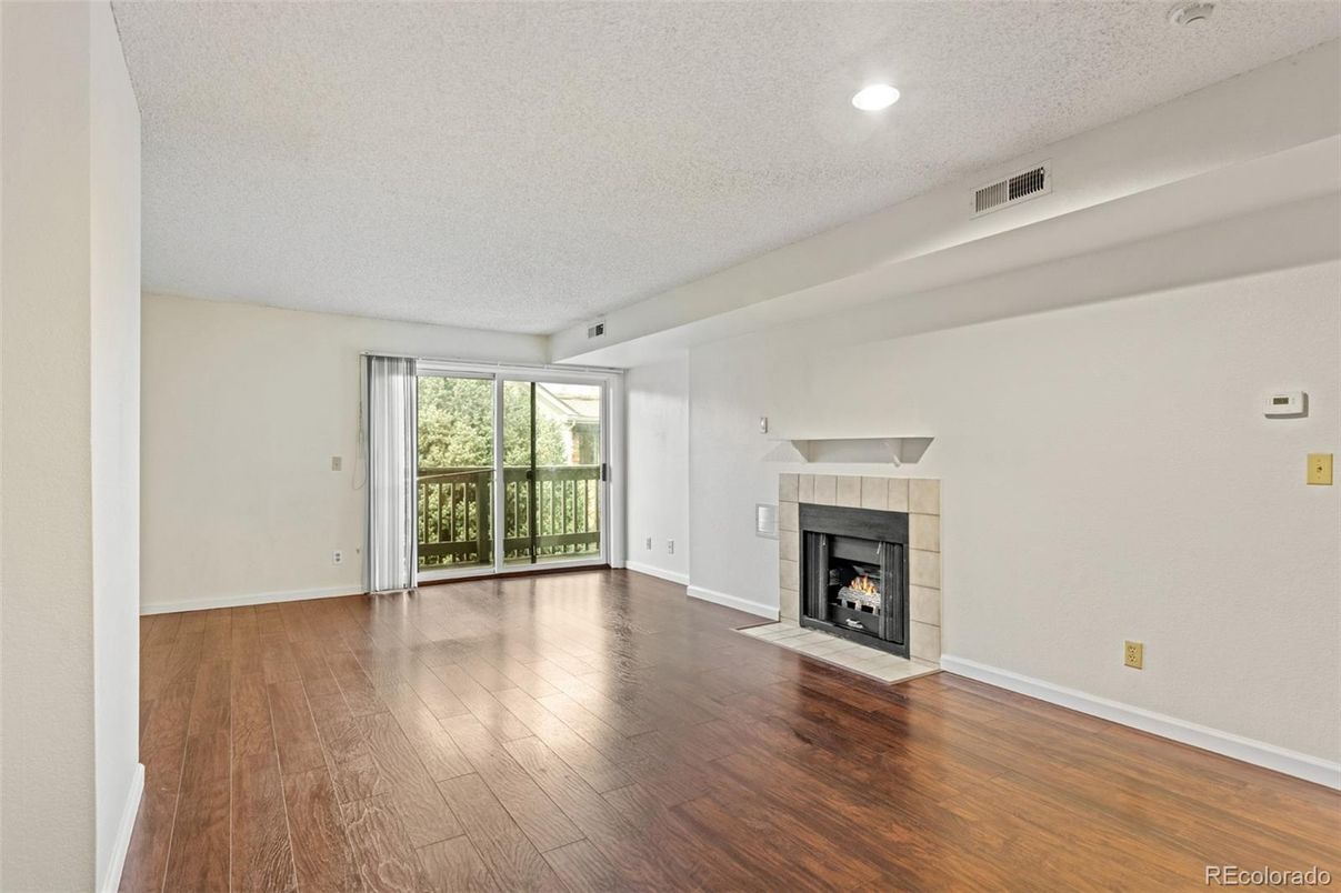 Empty room, Fireplace, Interior, Recessed Lighting, Wood Texture Flooring
