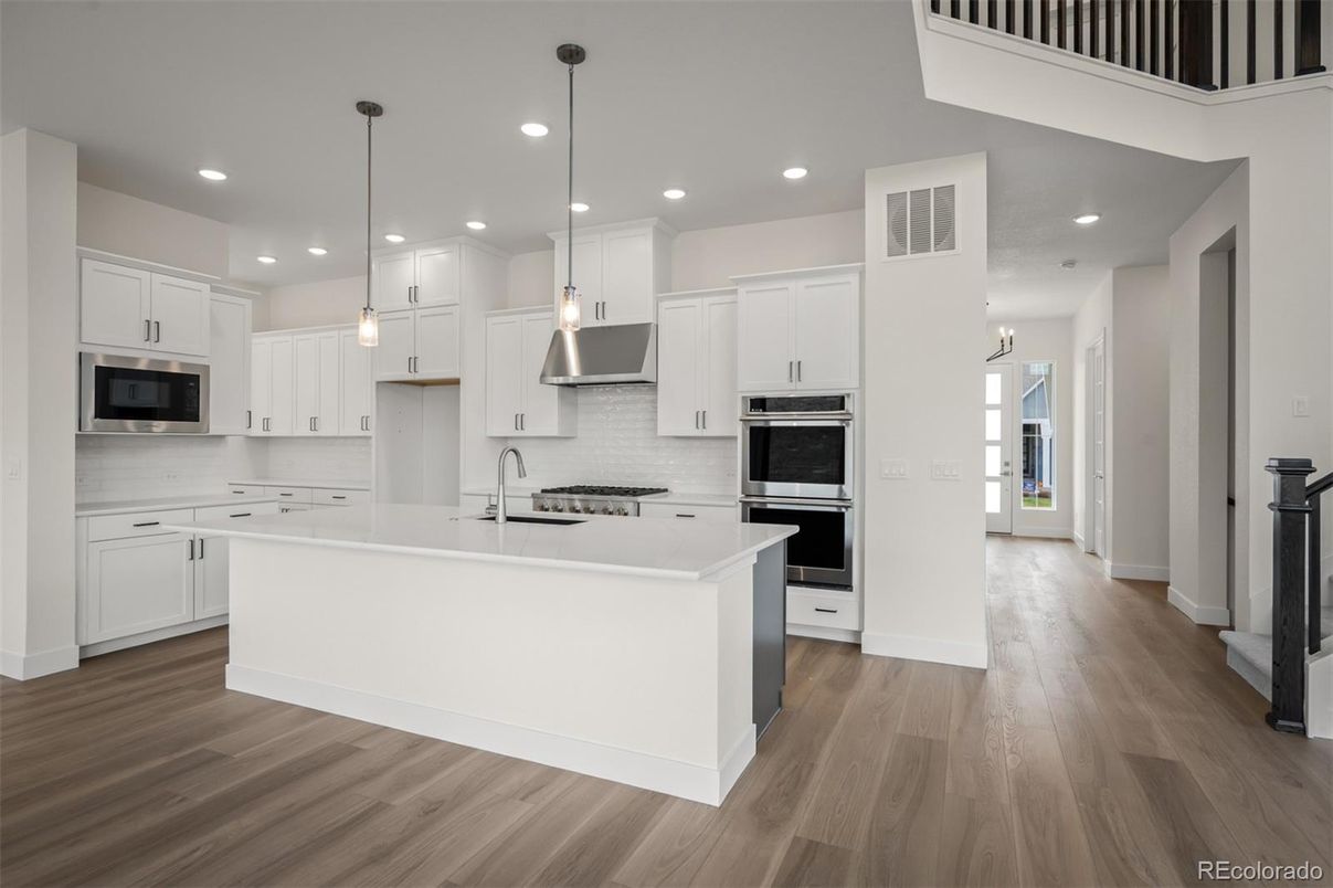 Interior, Kitchen, Pendant Lights, Recessed Lighting, Stainless Steel Appliances, Wood Texture Flooring