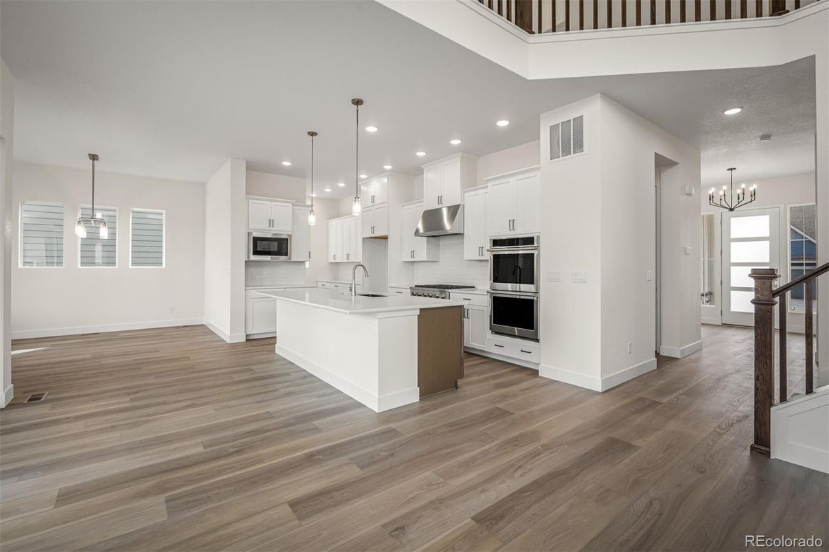 Chandelier, Interior, Kitchen, Pendant Lights, Recessed Lighting, Stainless Steel Appliances, Wood Texture Flooring