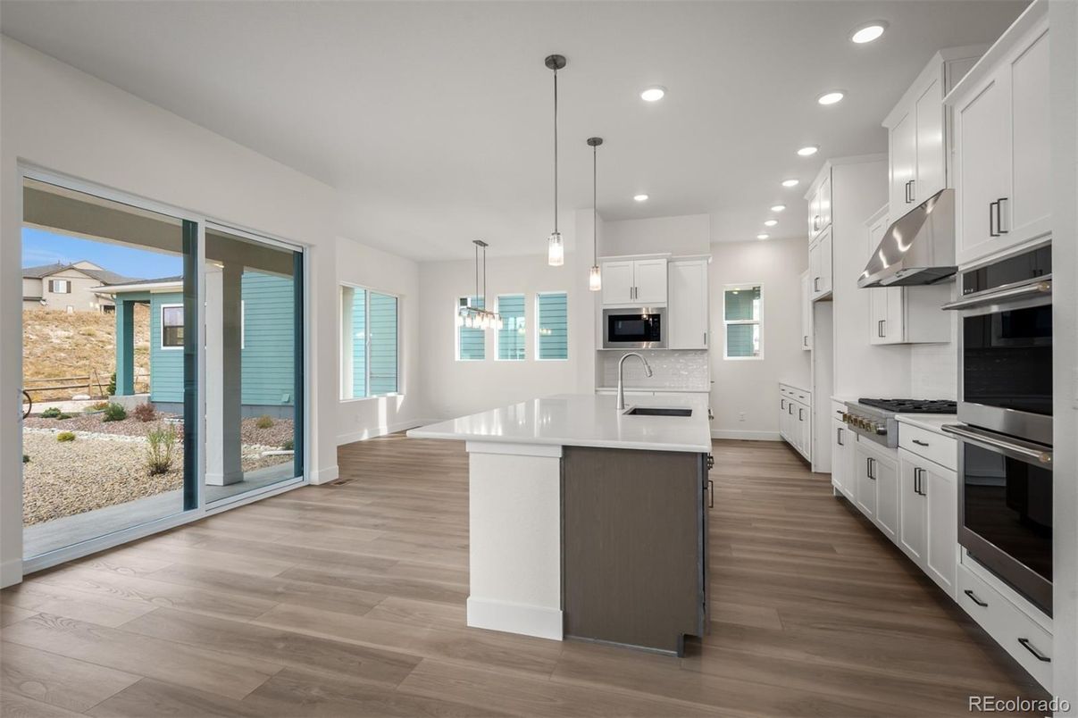 Interior, Kitchen, Pendant Lights, Recessed Lighting, Stainless Steel Appliances, Wood Texture Flooring