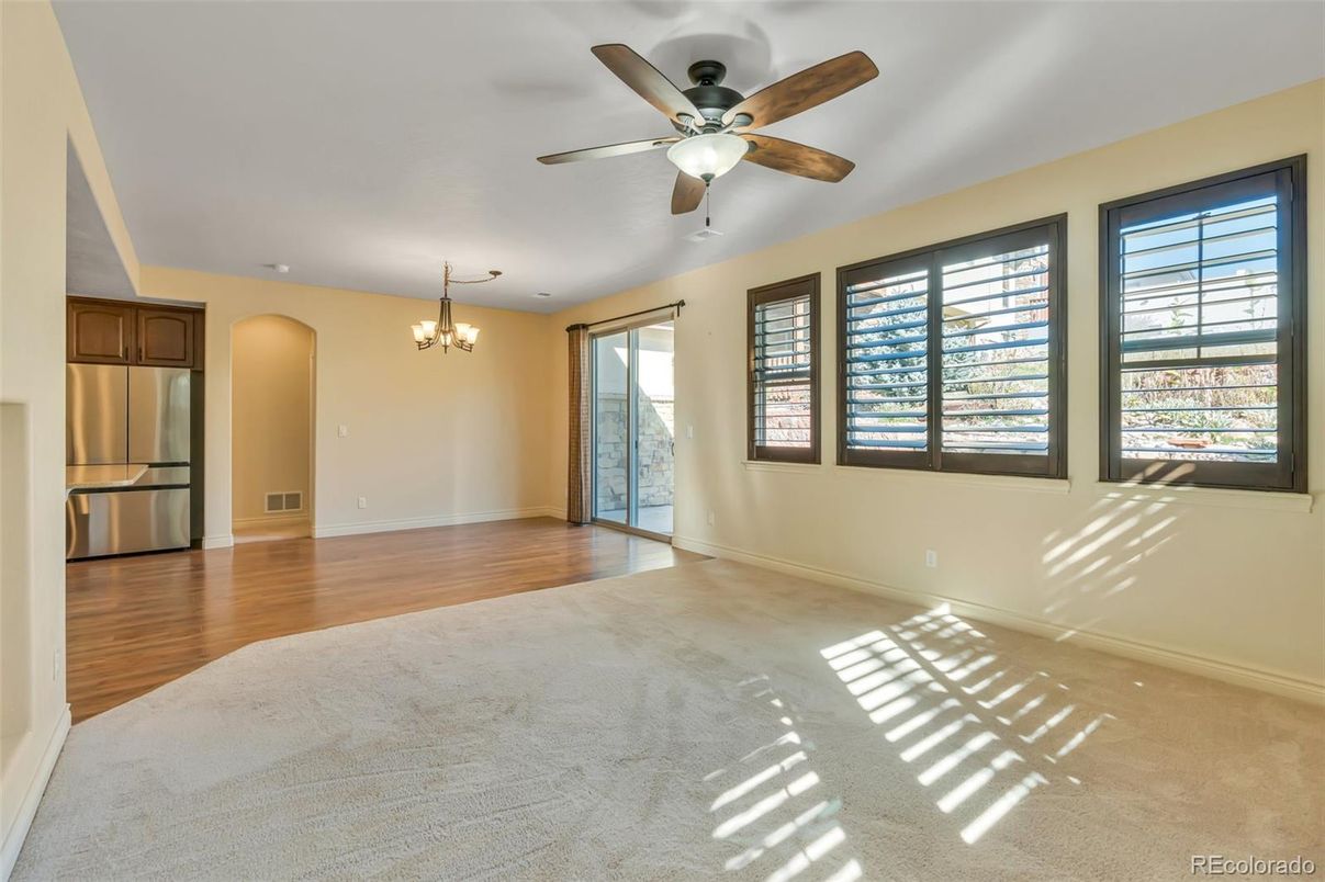 Chandelier, Empty room, Interior, Recessed Lighting, Stainless Steel Appliances, Wood Texture Flooring