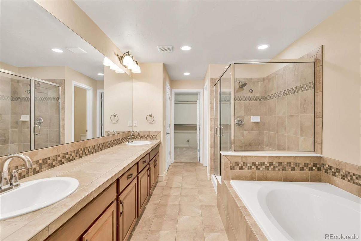 Bathroom, Dual Sink Vanities, Glass Shower, Interior, Recessed Lighting, Tile Countertops