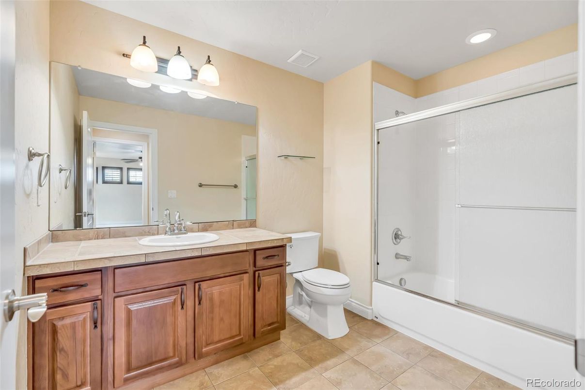 Bathroom, Glass Shower, Interior, Recessed Lighting, Tile Countertops