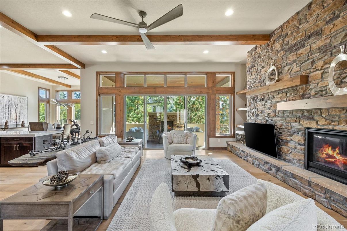 Dining room, Fireplace, Interior, Living room, Recessed Lighting, Stone Walls, Wooden Beams, Wood Texture Flooring