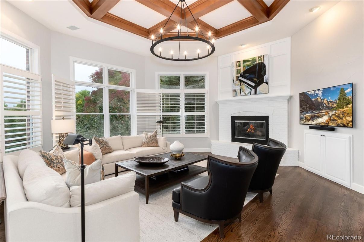 Chandelier, Fireplace, Interior, Living room, Pendant Lights, Recessed Lighting, Wooden Beams, Wood Texture Flooring