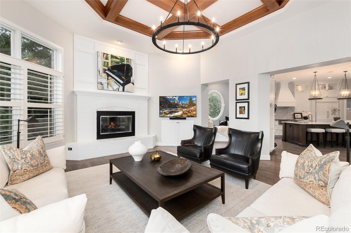 Chandelier, Fireplace, Interior, Kitchen, Living room, Pendant Lights, Recessed Lighting, Wood Texture Flooring