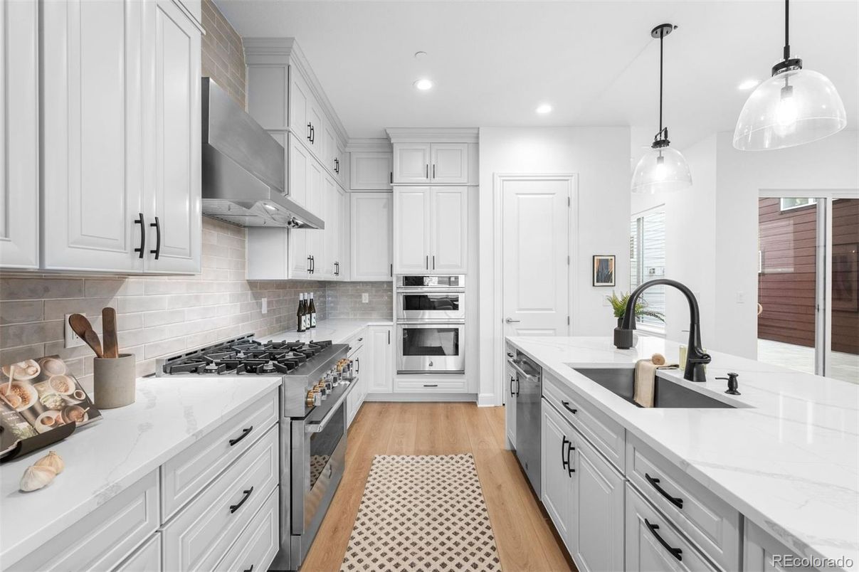 Interior, Kitchen, Pendant Lights, Recessed Lighting, Stainless Steel Appliances, Wood Texture Flooring