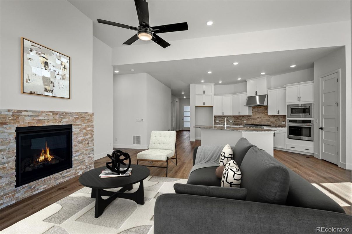 Fireplace, Interior, Kitchen, Living room, Recessed Lighting, Stainless Steel Appliances, Wood Texture Flooring