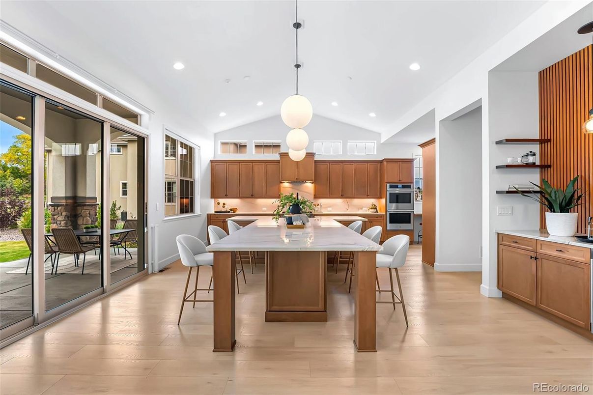 Dining room, Interior, Kitchen, Pendant Lights, Recessed Lighting, Stainless Steel Appliances, Wood Texture Flooring