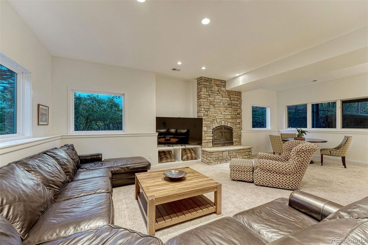 Dining room, Fireplace, Interior, Living room, Recessed Lighting, Stone Walls