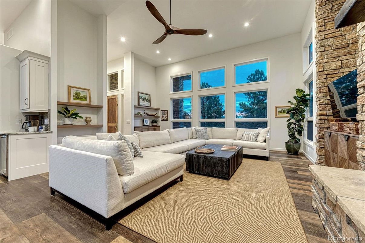 Fireplace, Interior, Living room, Recessed Lighting, Stone Walls, Wood Texture Flooring