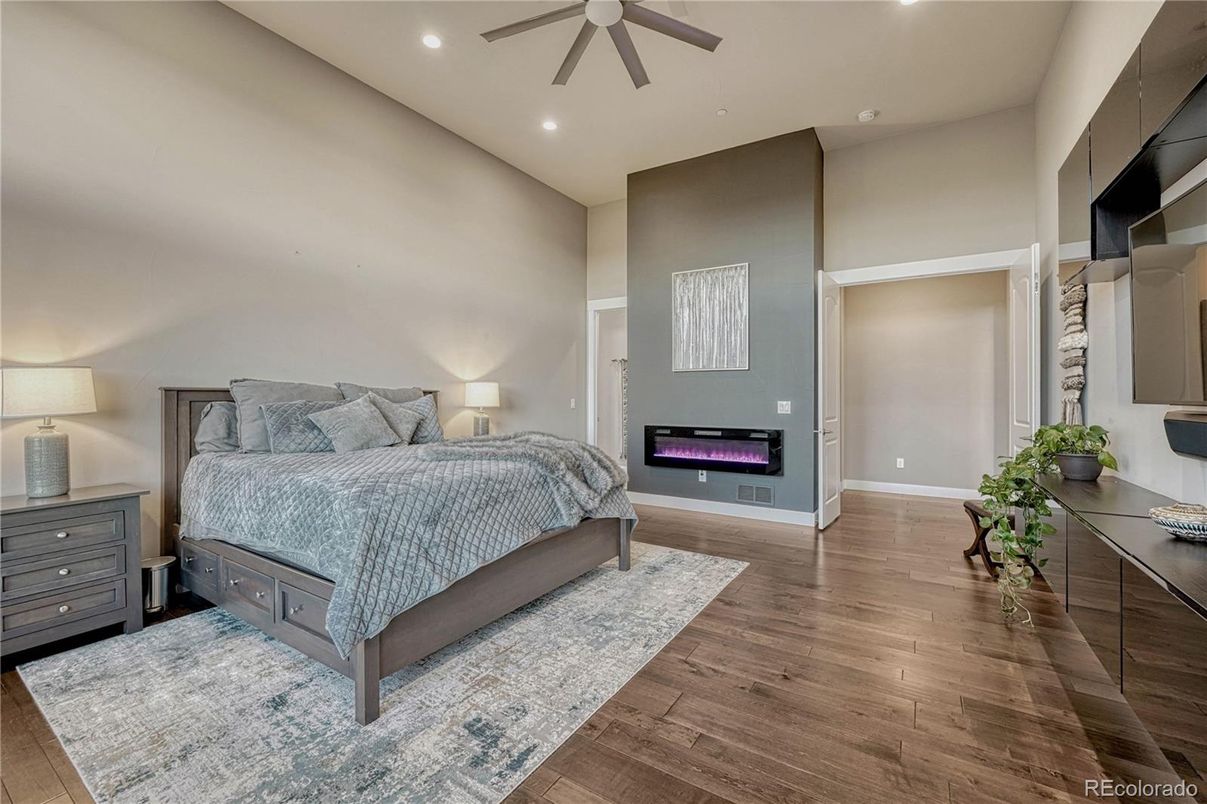 Bedroom, Fireplace, Interior, Recessed Lighting, Wood Texture Flooring