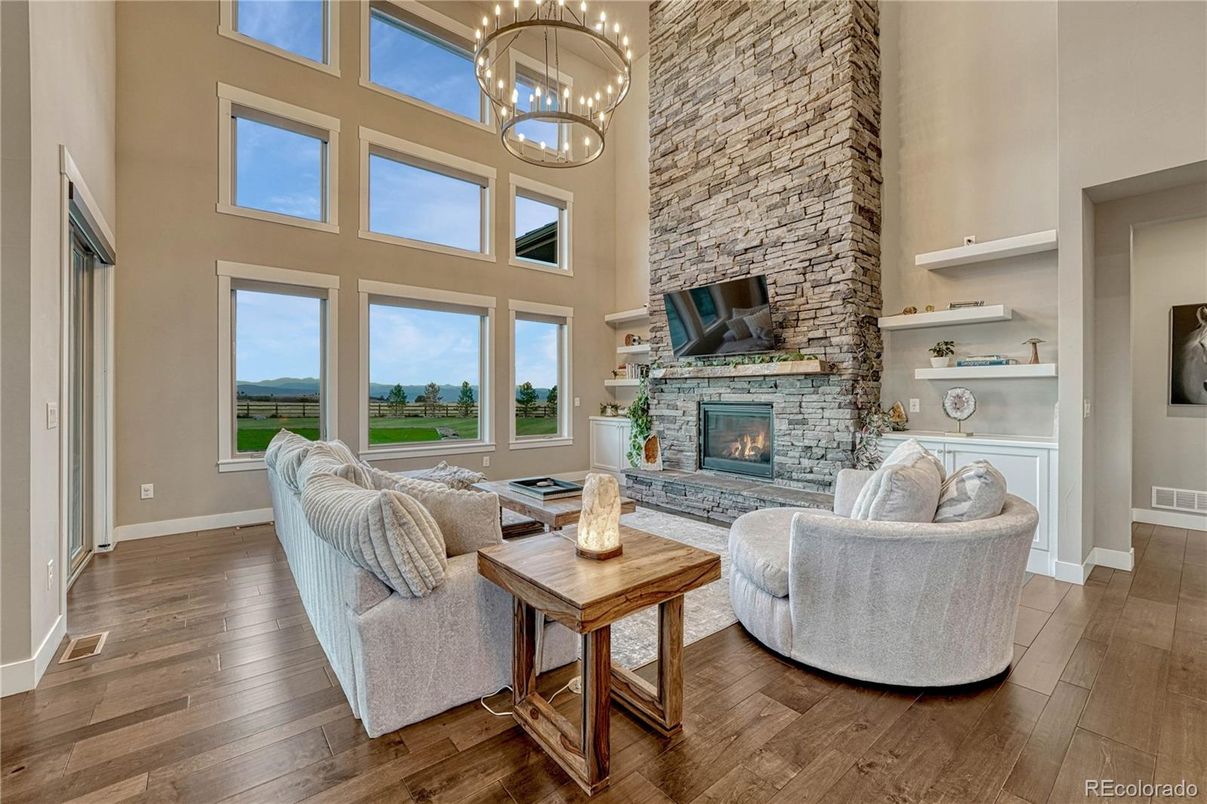 Fireplace, Interior, Living room, Pendant Lights, Stone Walls, Water, Wood Texture Flooring